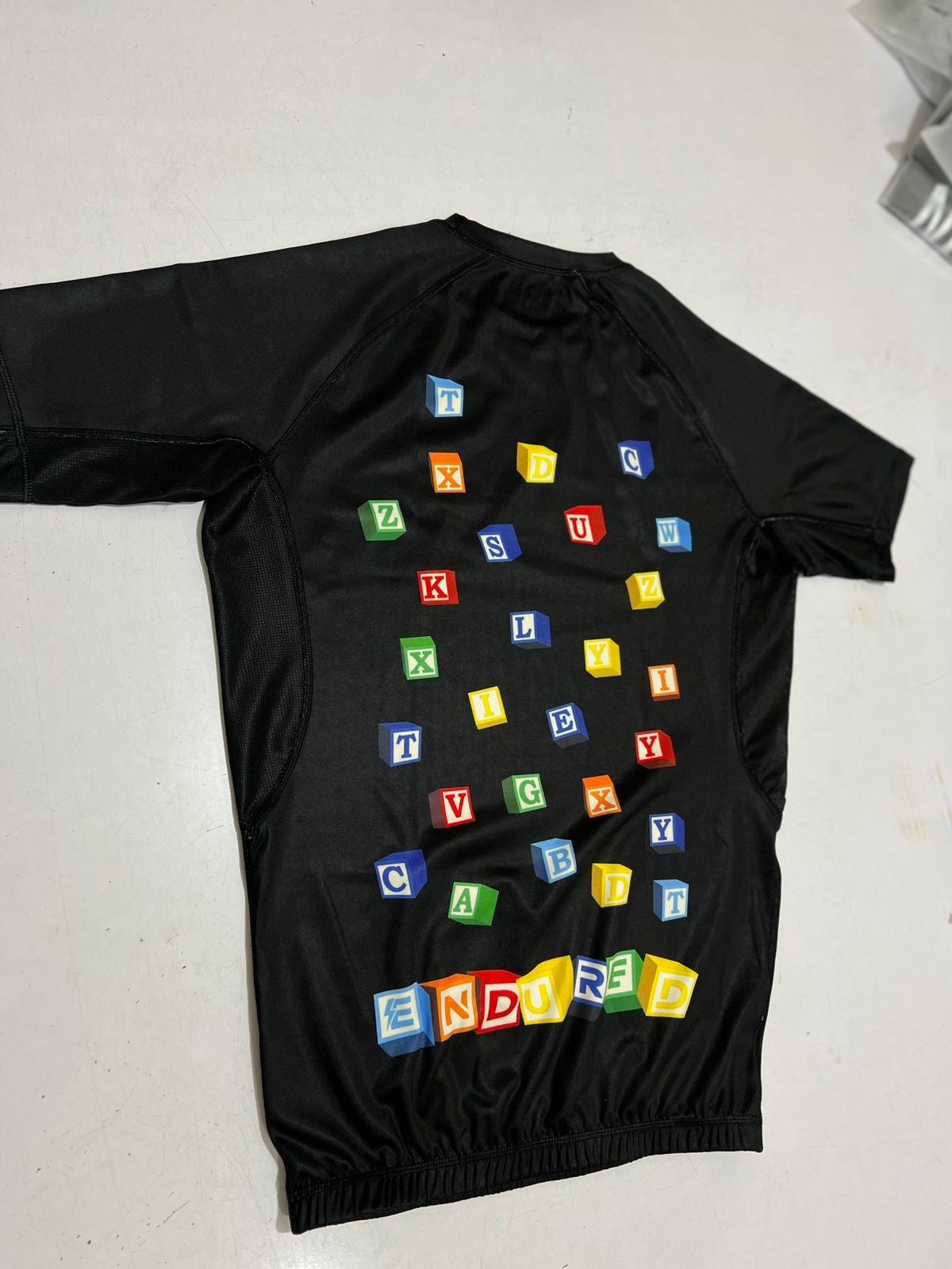 Toy block rashguard